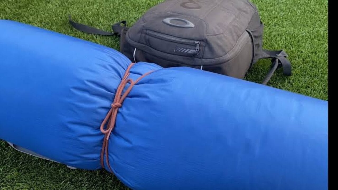 How to attach a sleeping bag to a backpack